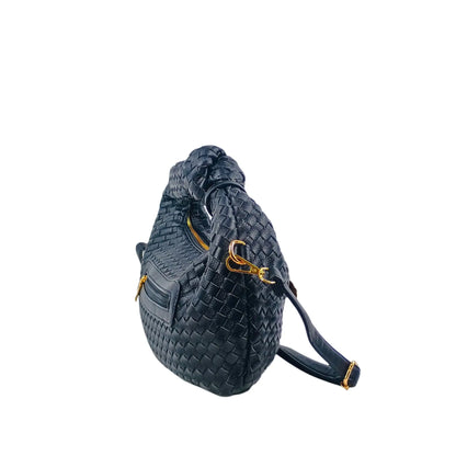 Black woven leather shoulder bag with gold hardware, zipper pockets, and removable shoulder strap